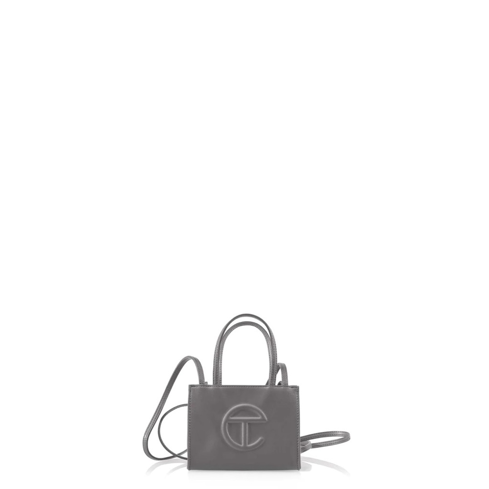 telfar small grey shopping bag.